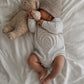 vetement-bebe-barboteuse-en-maille-arc-en-ciel-beige-et-gris