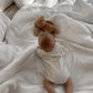 vetement-bebe-barboteuse-en-maille-arc-en-ciel-beige-et-gris