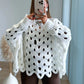 pull-de-grossesse-en-maille-ajourée-blanc-avec-trous-manches-bouffantes