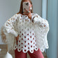 pull-de-grossesse-en-maille-ajourée-blanc-avec-trous-manches-bouffantes