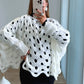pull-de-grossesse-en-maille-ajourée-blanc-avec-trous-manches-bouffantes