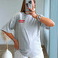 teeshirt-de-grossesse-gris-avec-ecritures-rouges