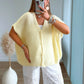 gilet-pull-douceur-manches-courtes-jaune-pastel