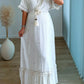robe-longue-de-grossesse-bohème-en-lin-avec-coeurs-brodés-dorés-et-franges