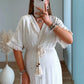 robe-longue-de-grossesse-bohème-en-lin-avec-coeurs-brodés-dorés-et-franges