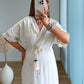 robe-longue-de-grossesse-bohème-en-lin-avec-coeurs-brodés-dorés-et-franges