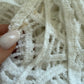Poncho-ajouré-de-grossesse-en-crochet-blanc
